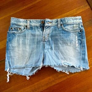 Buckle distressed denim shorts